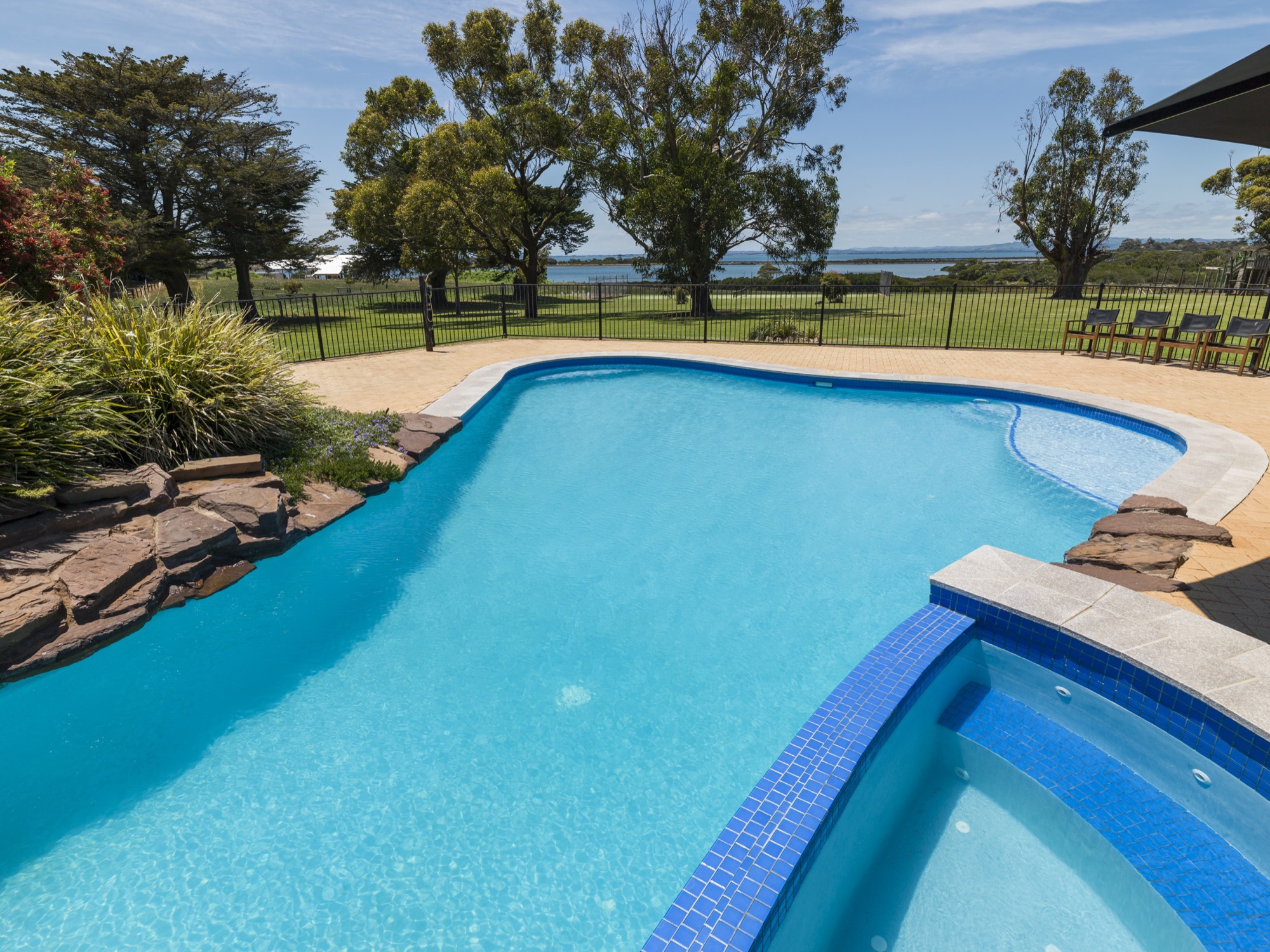 Enjoy the amazing bay views from our expansive private swimming pool